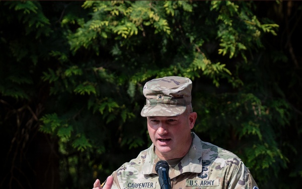 Col. Fausnaugh passes guidon to Col. Peterson at 19th BCD Change of Command