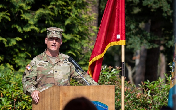 Col. Fausnaugh passes guidon to Col. Peterson at 19th BCD Change of Command