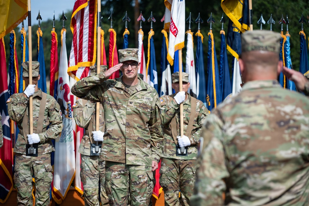 Col. Fausnaugh passes guidon to Col. Peterson at 19th BCD Change of Command