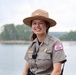 U.S. Army Corps of Engineers park ranger poses at waterfront recreation area