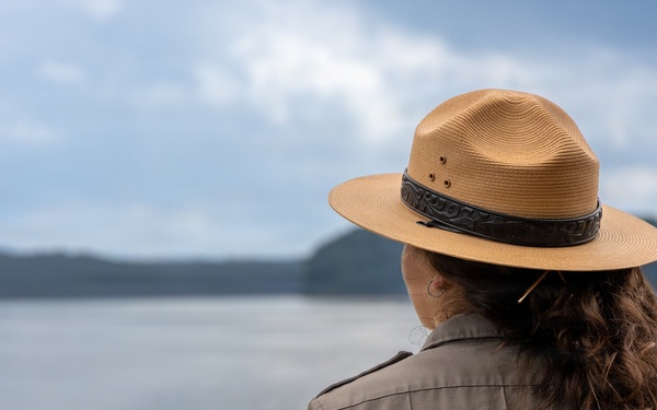 Park Ranger Surveys Waterway from Overlook