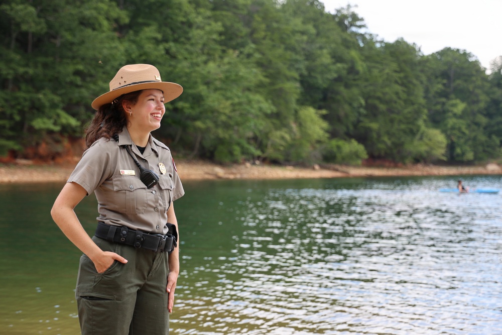 U.S. Army Corps of Engineers park ranger monitors recreational activity at lakeside recreation area