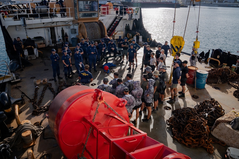 Partner nations participate in a buoy restoration project during RIMPAC 26