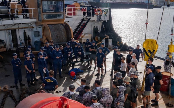 Partner nations participate in a buoy restoration project during RIMPAC 26
