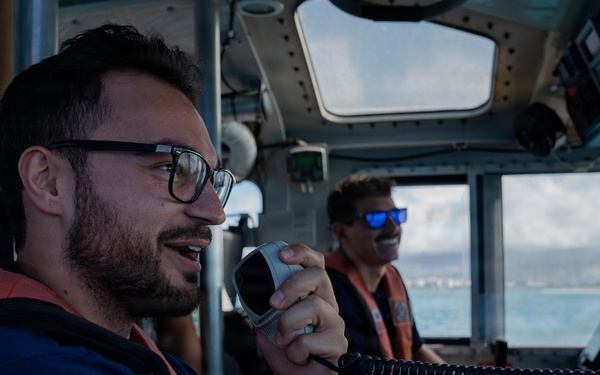 Partner nations participate in a buoy restoration project during RIMPAC 26