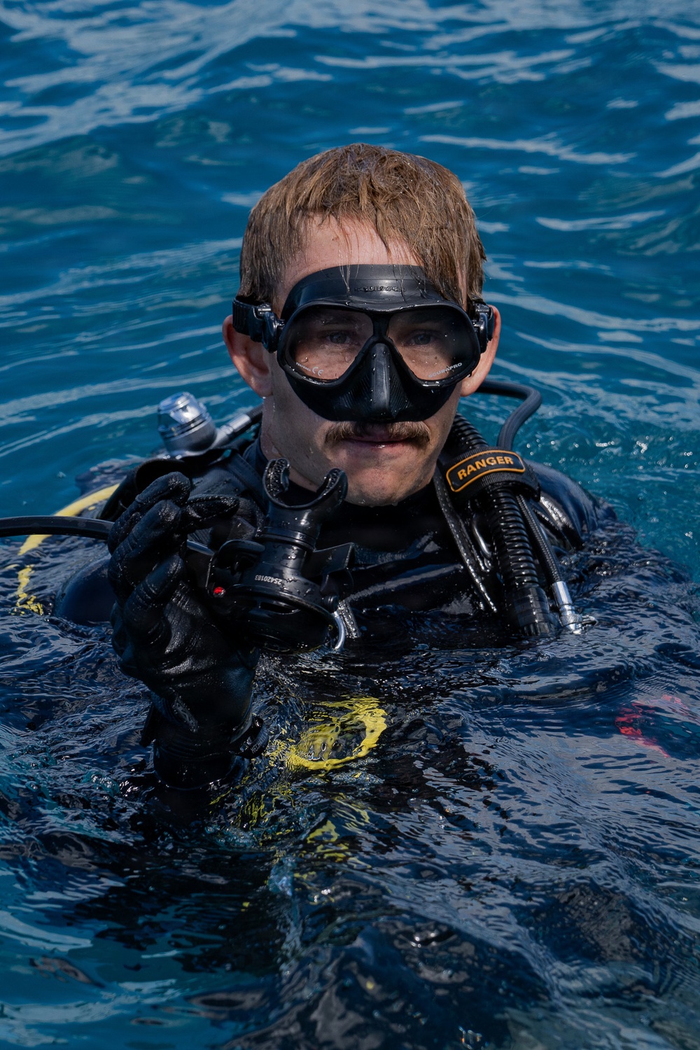 Partner nations participate in a buoy restoration project during RIMPAC 26