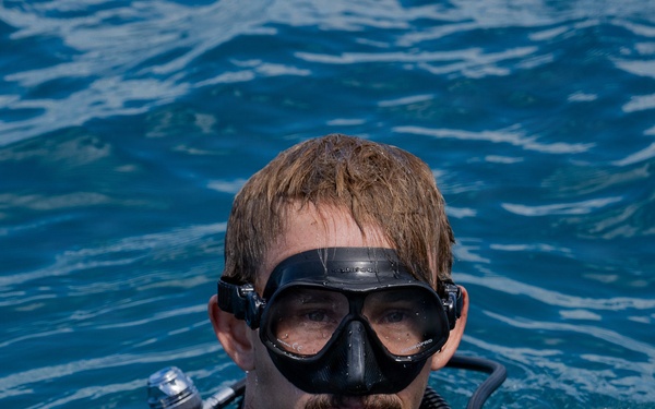 Partner nations participate in a buoy restoration project during RIMPAC 26
