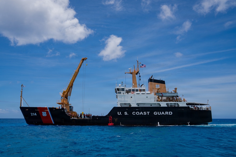 Partner nations participate in a buoy restoration project during RIMPAC 26