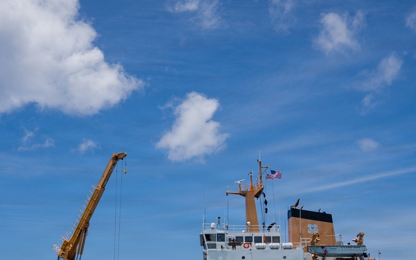 Partner nations participate in a buoy restoration project during RIMPAC 26