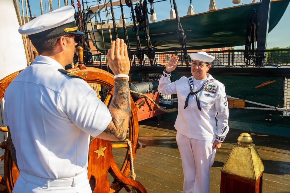 USS Arlington (LPD 24) Sailors reenlist on USS Constitution