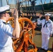 USS Arlington (LPD 24) Sailors reenlist on USS Constitution