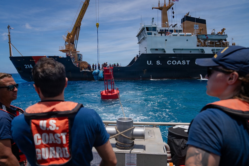 Partner nations participate in a buoy restoration project during RIMPAC 26