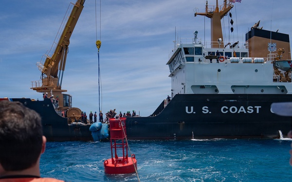 Partner nations participate in a buoy restoration project during RIMPAC 26