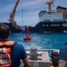 Partner nations participate in a buoy restoration project during RIMPAC 26