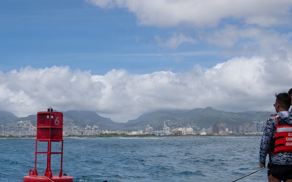 Partner nations participate in a buoy restoration project during RIMPAC 26