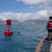 Partner nations participate in a buoy restoration project during RIMPAC 26