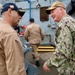 Rear Adm. T.J. Zerr speaks to Waterfront Leadership aboard USS Stout (DDG 55)