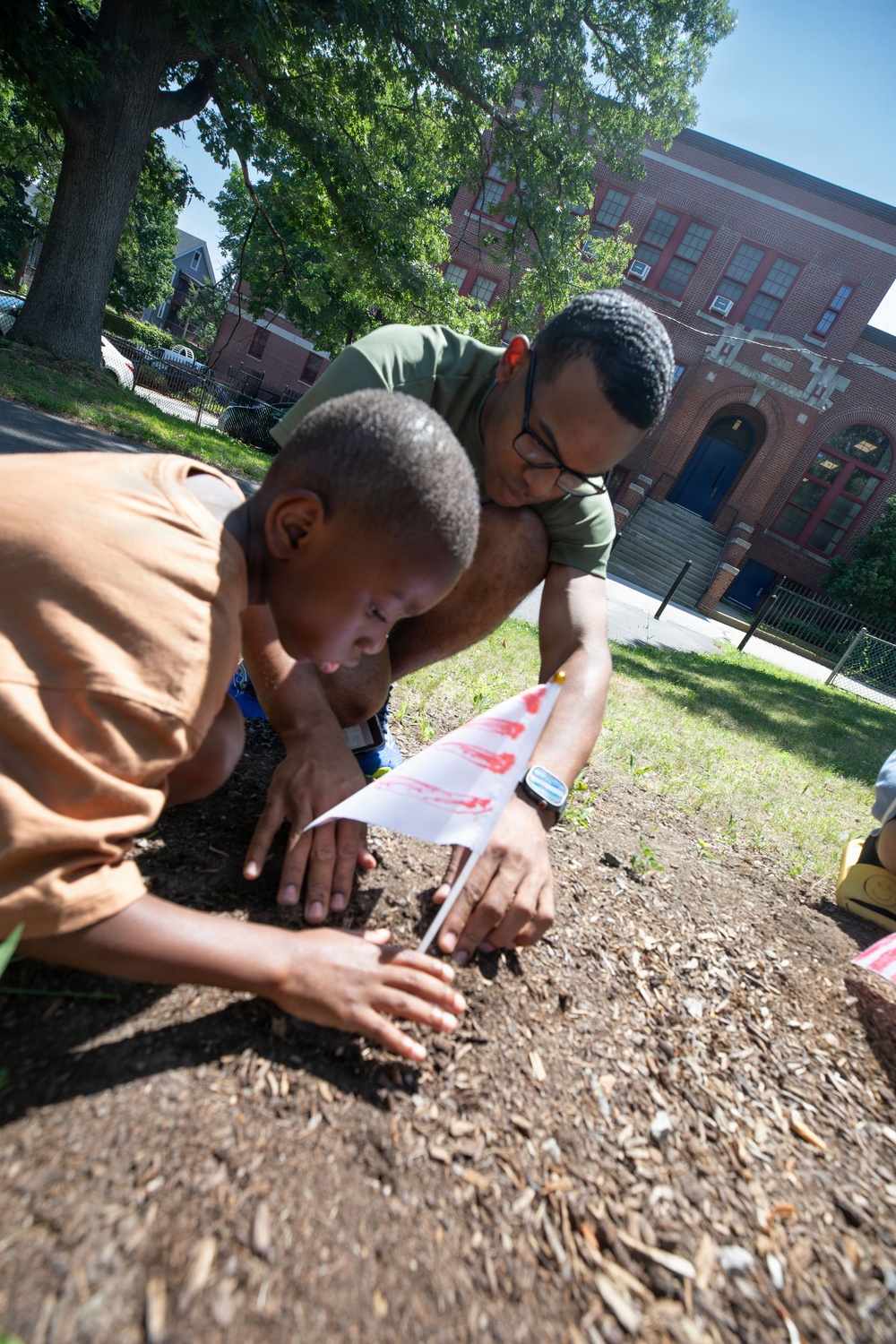 U.S. Sailors, Marines Conduct Community Outreach YMCA During Sail250 Boston