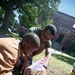 U.S. Sailors, Marines Conduct Community Outreach YMCA During Sail250 Boston