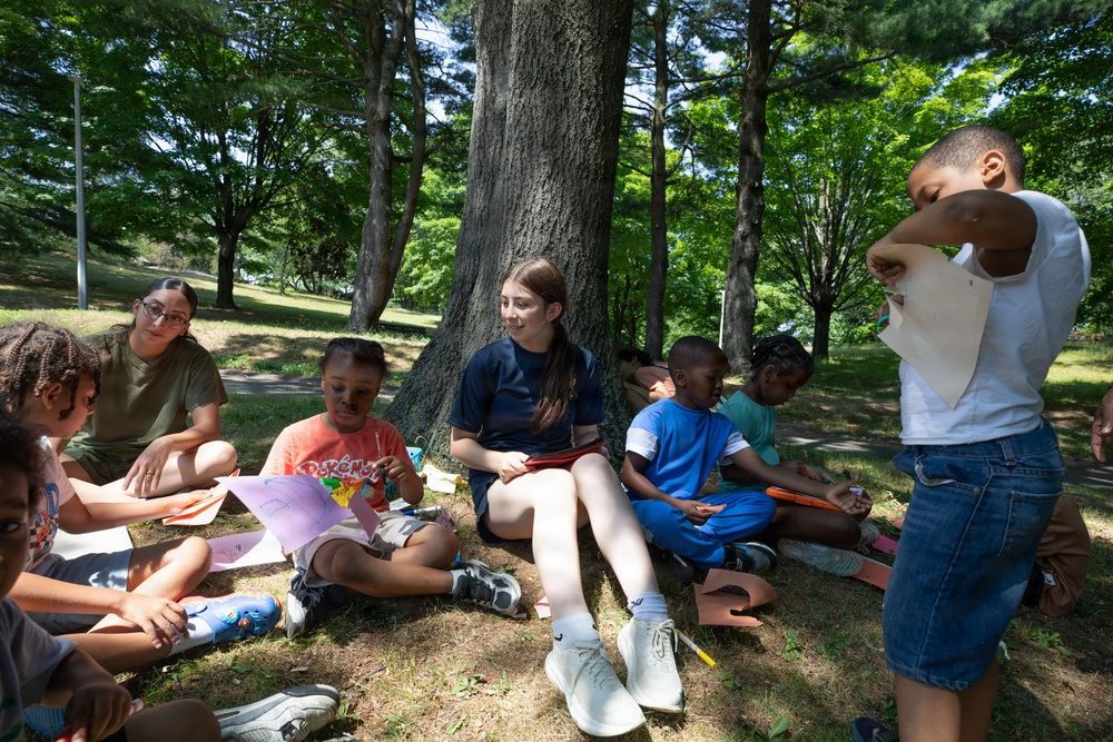 U.S. Sailors, Marines Conduct Community Outreach YMCA During Sail250 Boston