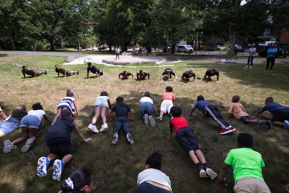 U.S. Sailors, Marines Conduct Community Outreach YMCA During Sail250 Boston