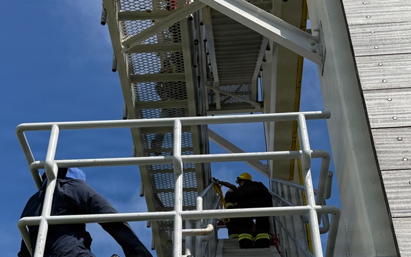 Firefighters conduct rescue training at Torii Station