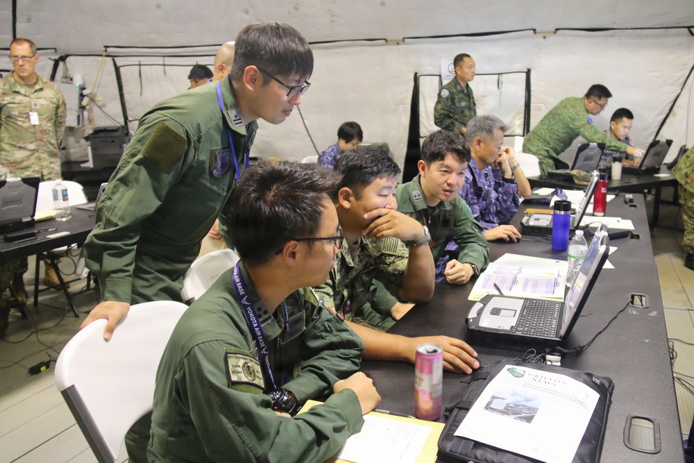 Multinationals participate in humanitarian assistance and disaster relief training during RIMPAC 2026