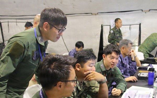 Multinationals participate in humanitarian assistance and disaster relief training during RIMPAC 2026