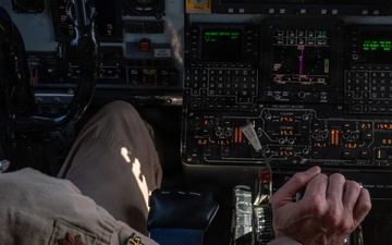 KC-135 refuels F-15s during night operations in CENTCOM AOR