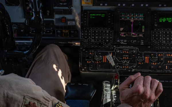 KC-135 refuels F-15s during night operations in CENTCOM AOR