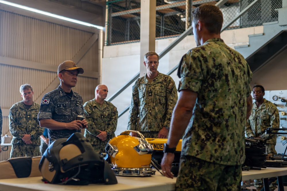 ROK Rear Adm. Inho Kim attends DV tour at Navy Expeditionary compound during RIMPAC 2026
