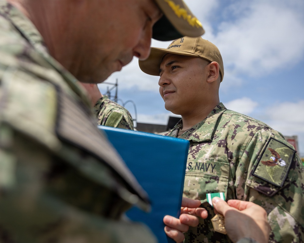 Commander of CTF 64 awards USS Bulkeley (DDG 84) Sailors