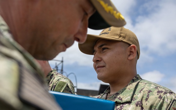 Commander of CTF 64 awards USS Bulkeley (DDG 84) Sailors