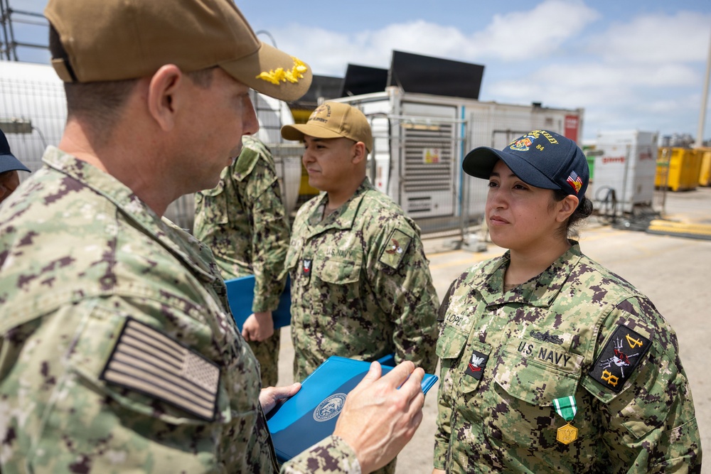 Commander of CTF 64 awards USS Bulkeley (DDG 84) Sailors