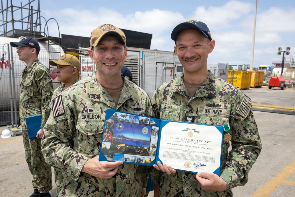 Commander of CTF 64 awards USS Bulkeley (DDG 84) Sailors