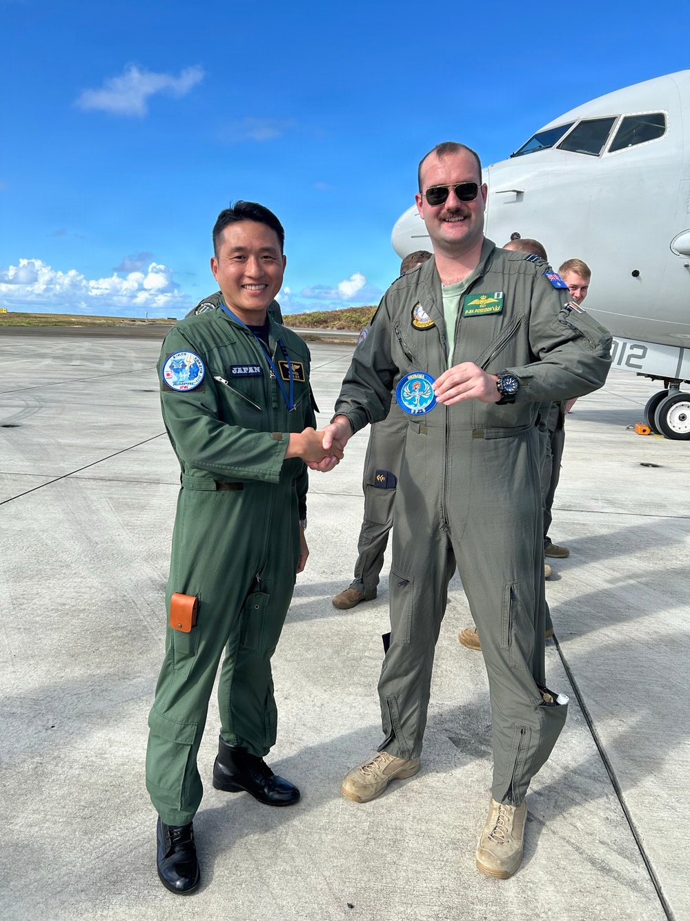 Japan Maritime Self-Defense Force and Royal Australian Navy aviation personnel conduct a professional exchange during RIMPAC 2026