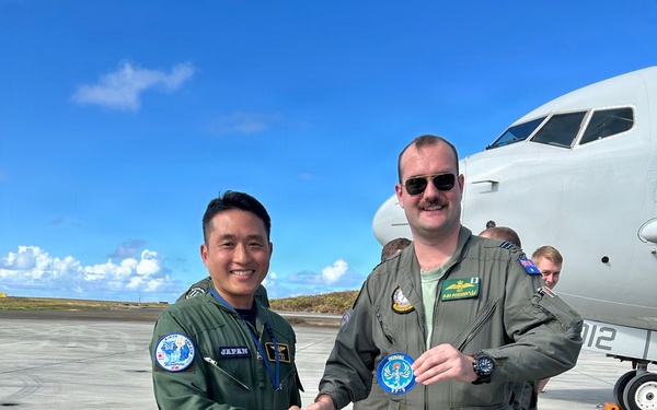 Japan Maritime Self-Defense Force and Royal Australian Navy aviation personnel conduct a professional exchange during RIMPAC 2026