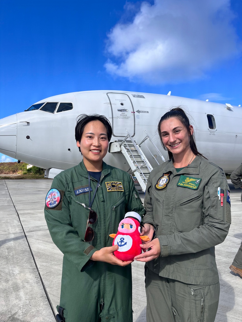 Japan Maritime Self-Defense Force and Royal Australian Navy aviation personnel conduct a professional exchange during RIMPAC 2026