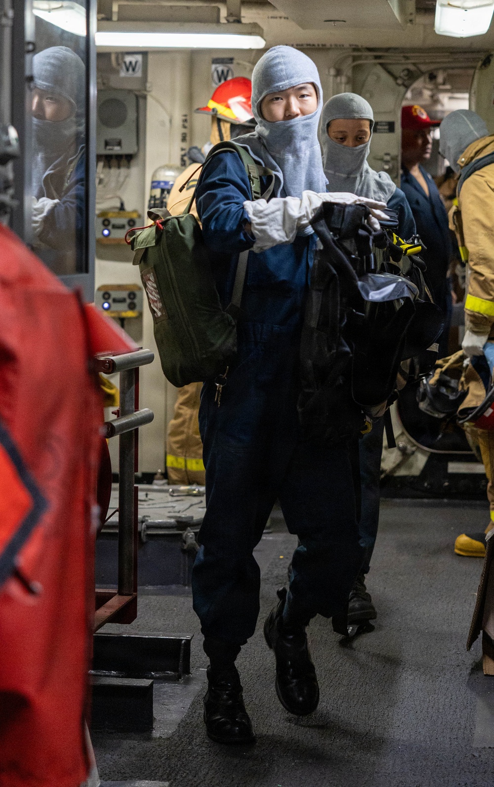 USS Mustin conducts an integrated training team drill
