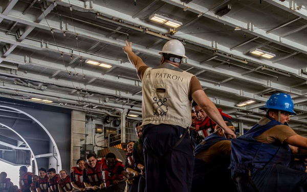 Abraham Lincoln Conducts a Replenishment-at-Sea with USNS Cesar Chavez