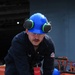 USS John C. Stennis Sailor Rolls Fire Hoses