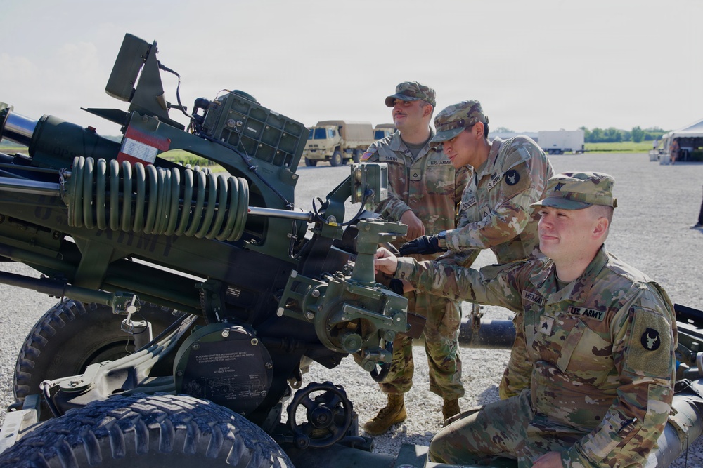 Iowa National Guard soldiers prepare ceremonial artillery salute