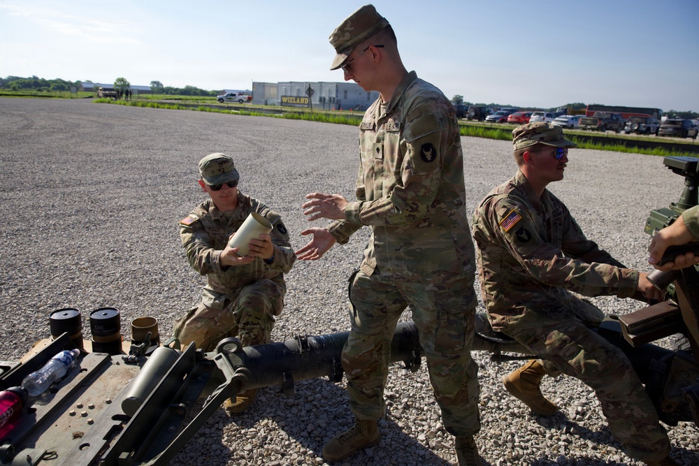 Iowa National Guard soldiers prepare ceremonial artillery salute