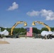 Iowa National Guard soldiers fire ceremonial artillery salute