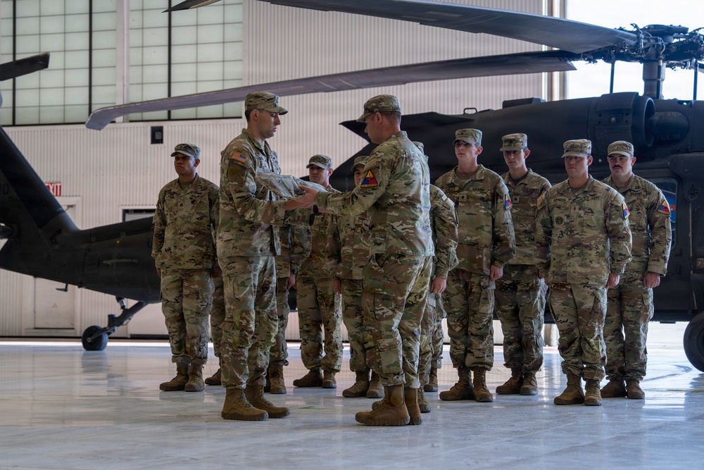 3-501st AHB-M, 1st AD CAB, furls Bravo Company's colors
