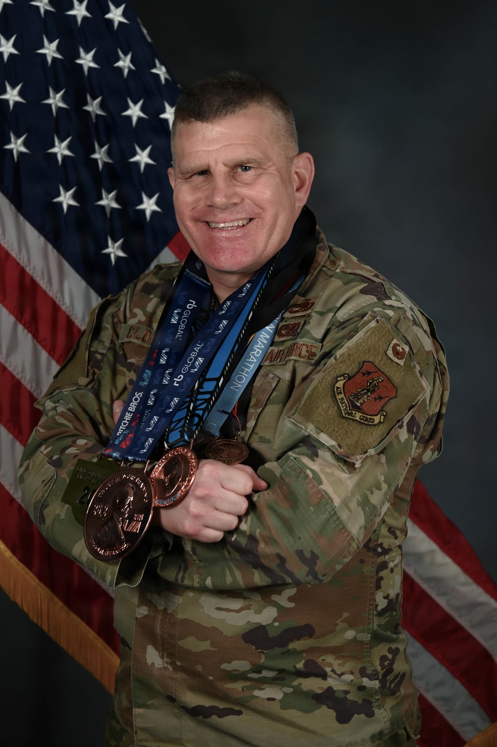 RING Endurance Team Coordinator Displays Years of Marathon Medals