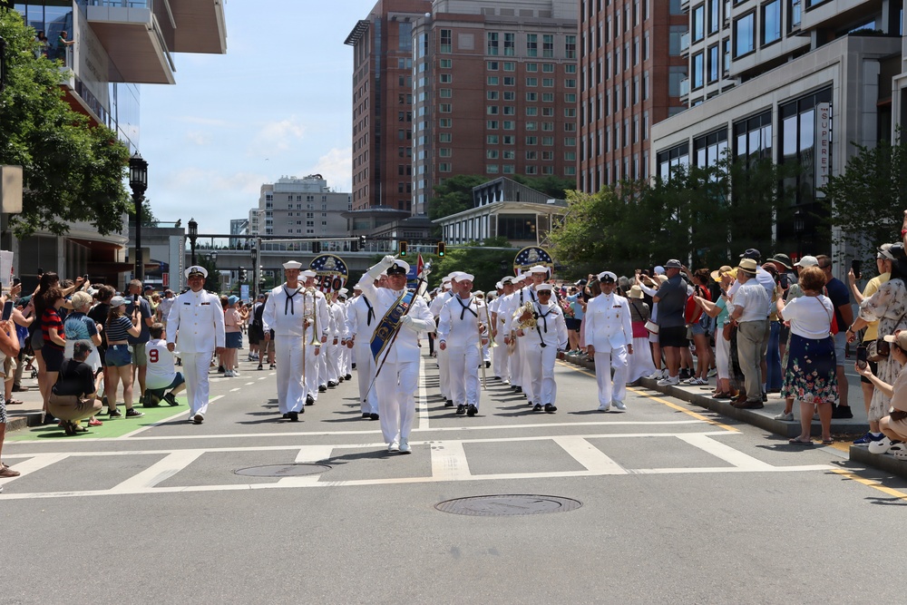 Navy Band Northeast proudly marched through downtown Boston during the Crew and Cadet Parade as part of Sail Boston