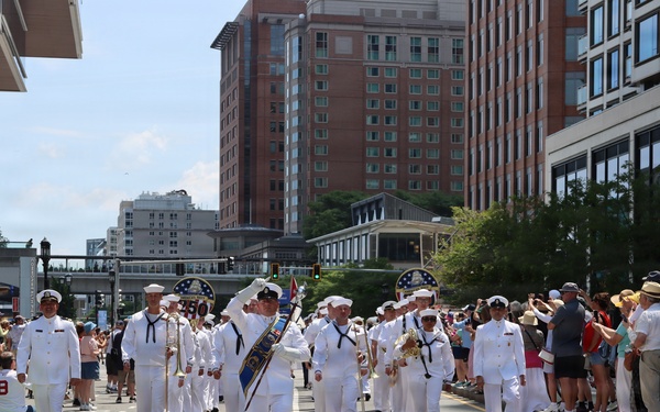 Navy Band Northeast proudly marched through downtown Boston during the Crew and Cadet Parade as part of Sail Boston