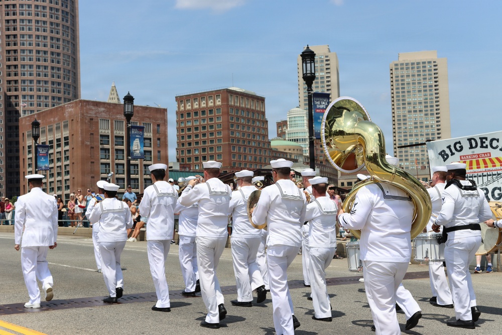 Navy Band Northeast proudly marched through downtown Boston during the Crew and Cadet Parade as part of Sail Boston.