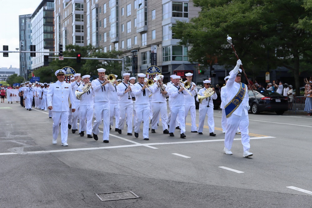 Navy Band Northeast proudly marched through downtown Boston during the Crew and Cadet Parade as part of Sail Boston